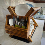 Wood Ceylon wooden dish drying rack holding plates, bowls, and utensils on kitchen counter
