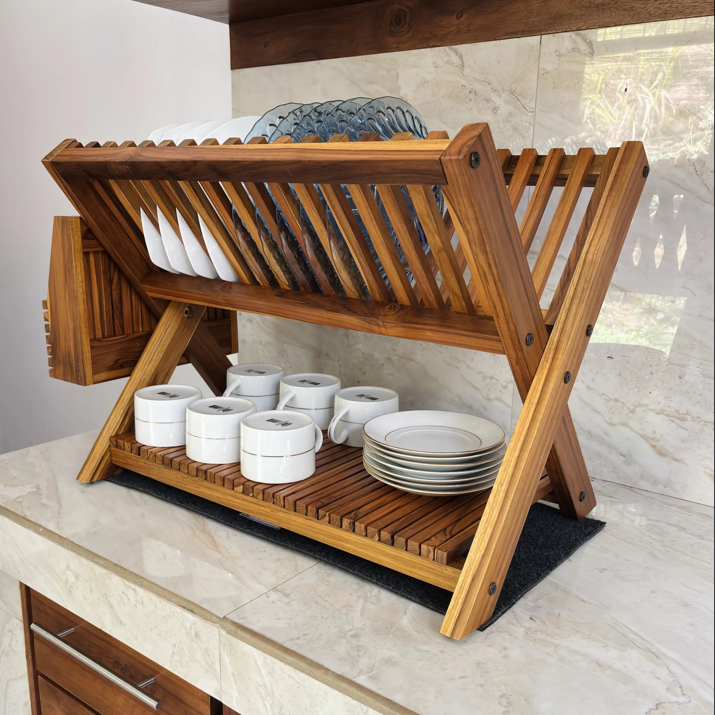 Wood Ceylon wooden dish drying rack with slats holding plates and cups on kitchen counter