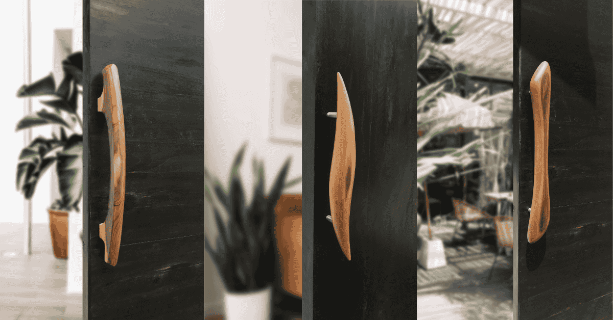 Handmade durable wooden door handles made from teak wood installed on black doors showcasing elegant design